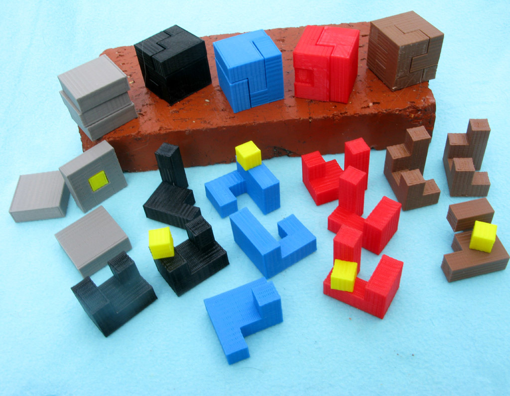 Five Hide the Cube Puzzles  