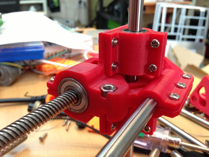 X-axis idler for linear stepping motor.