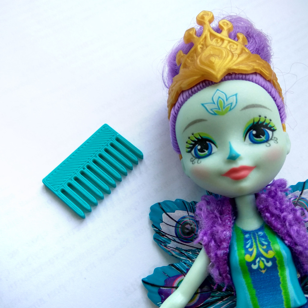 Hairbrush for toy doll puppet