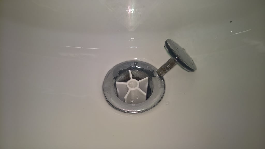 Sink hole cap holder