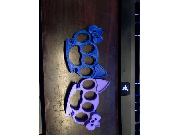 3D Printed ”Brass” Knuckles! My own design so I'm pretty proud. On  Thingiverse if you want it:) thing:4939644 : r/3Dprinting