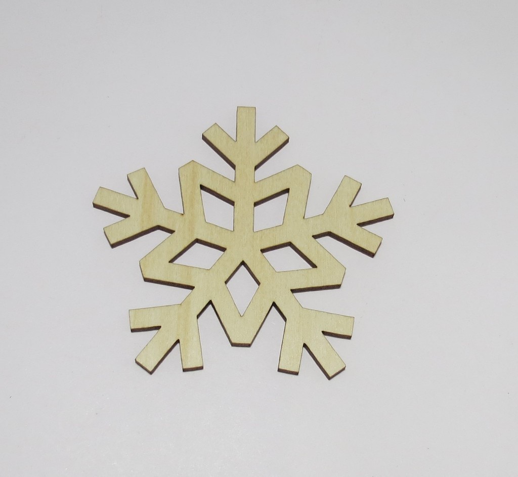 Laser cut Snowflake shaped coasters made of Birch Plywood