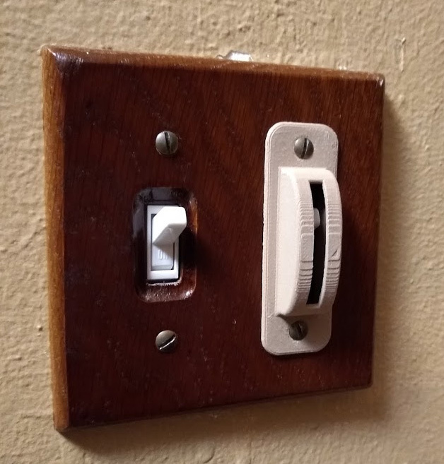 Light switch cover with slit
