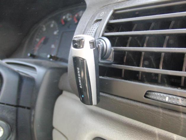 Holder for the bluetooth headset in the car