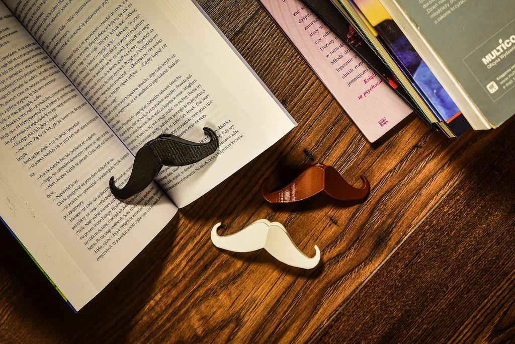 Mustache page holder