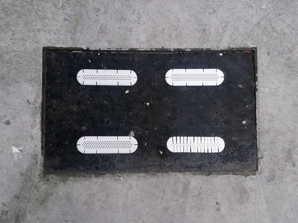Porous plates for manhole cover