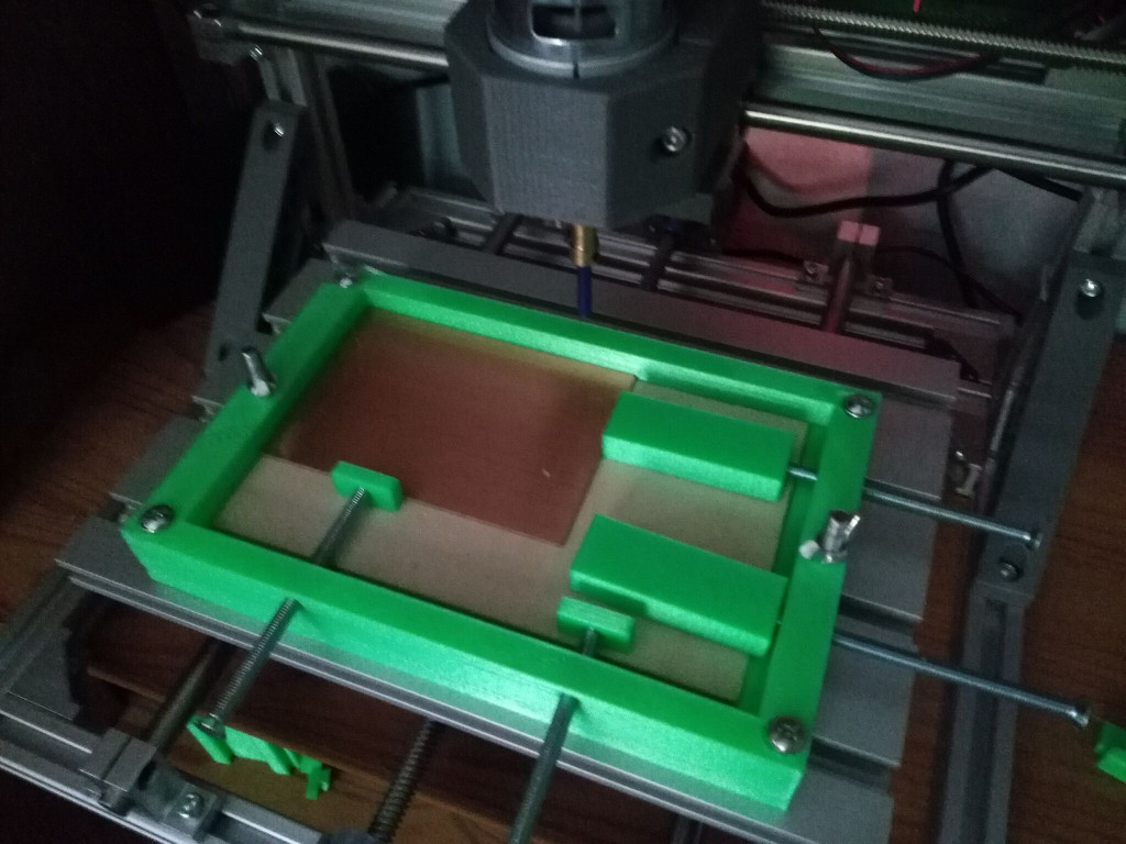 Frame to hold workpiece on a DIY CNC Router