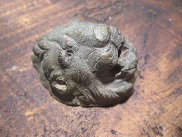 Roman lion's head in bronze