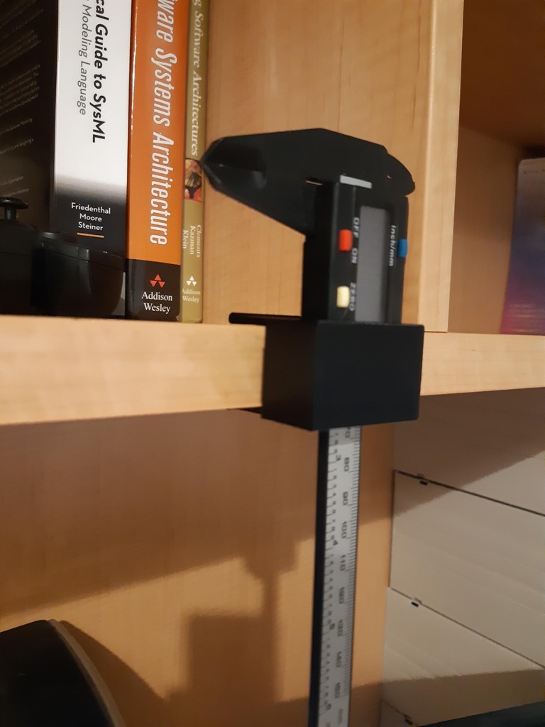 Caliper hanger for 25mm bookshelving