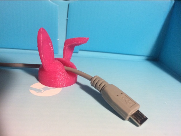 Bunny eared cable holder