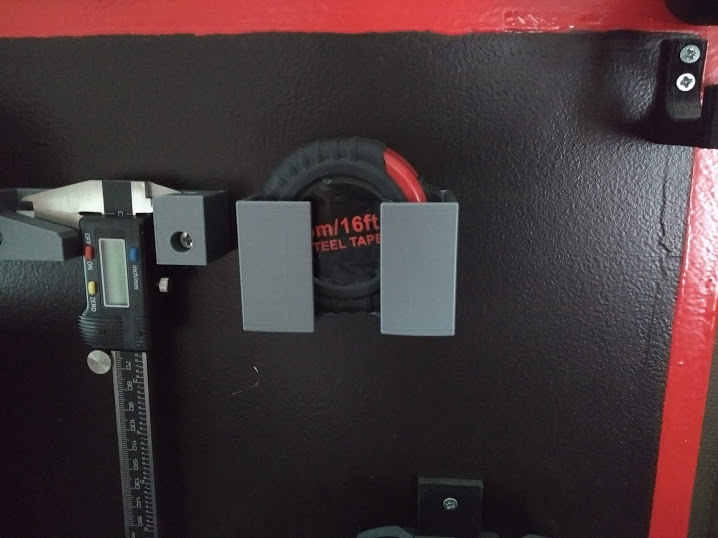 Tape measure holder