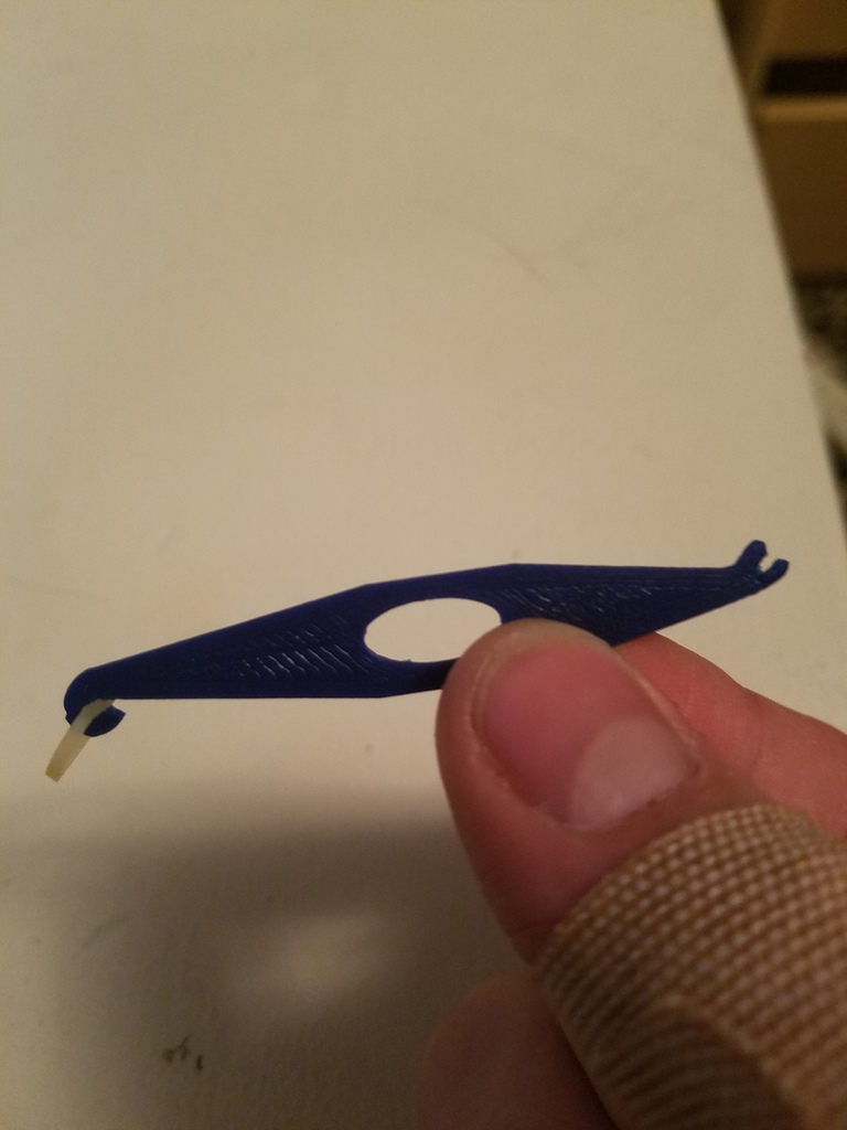 elastic band tool/hook for braces