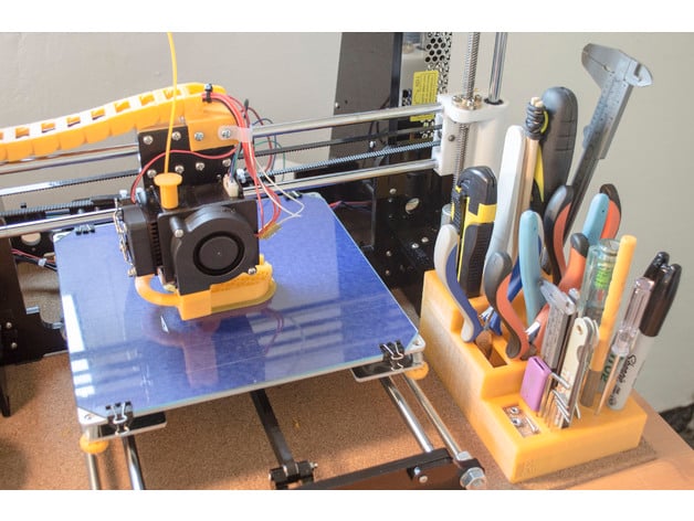Modular desktop tool holder for 3D printing.