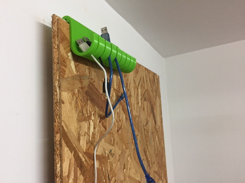 USB cable hanger for OSB wood planks
