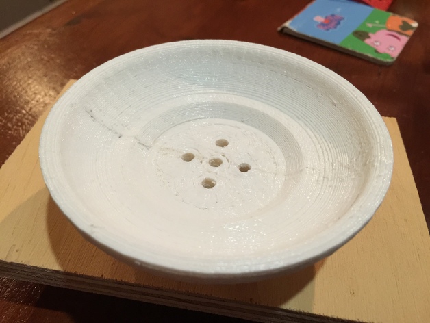 Round soap dish with drain holes