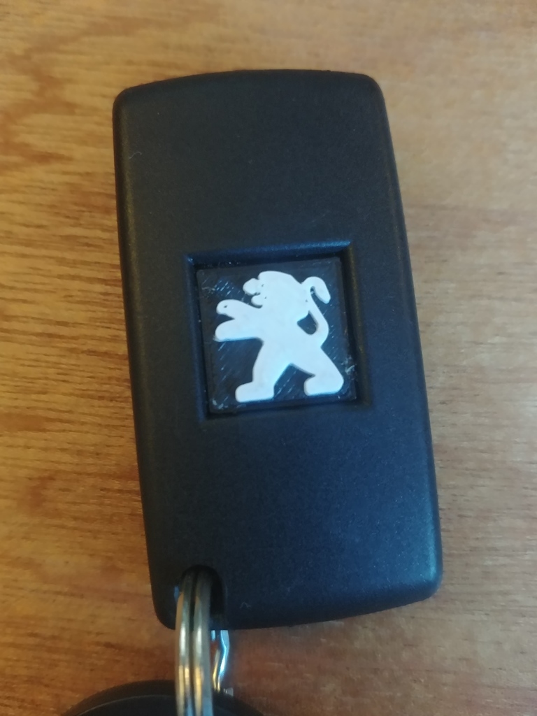 Peugeot logo for flip key