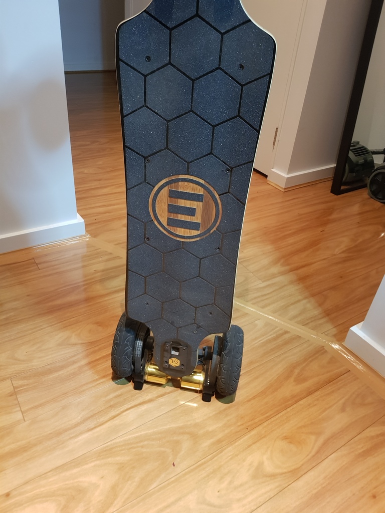 Evolve skateboard AT belt cover stand