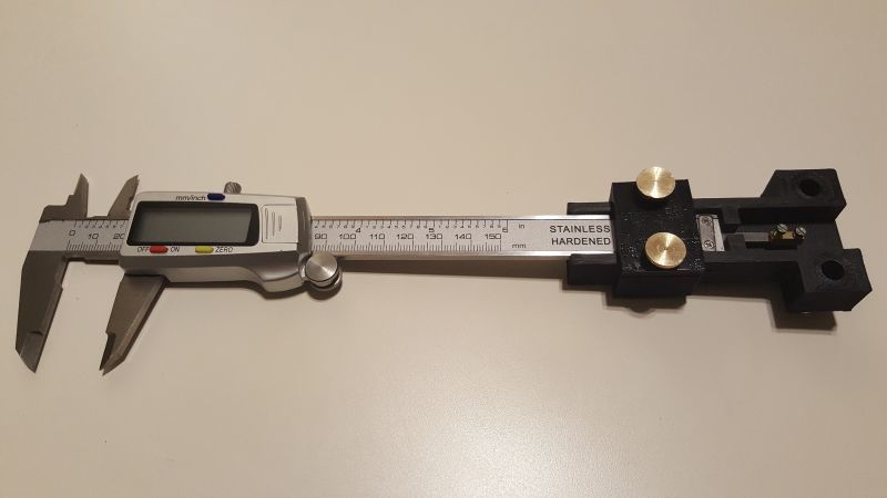 Digital caliper extruder calibration tool