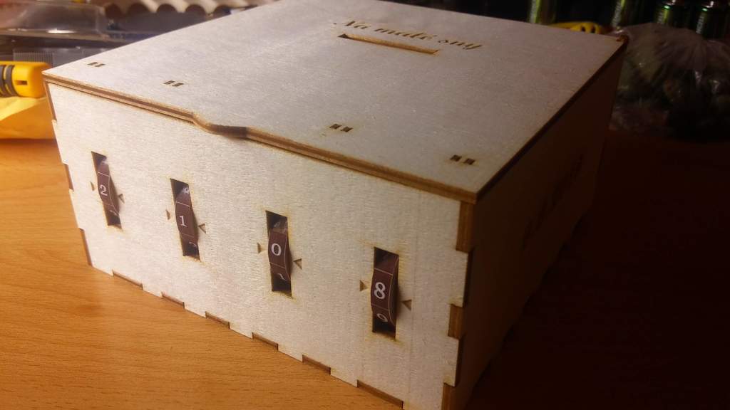 Wooden combination money-box 