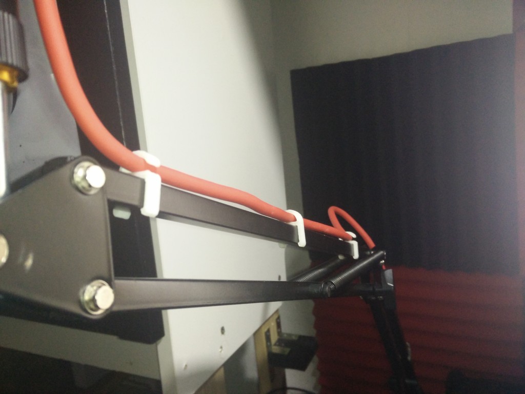 Mic arm cable clip