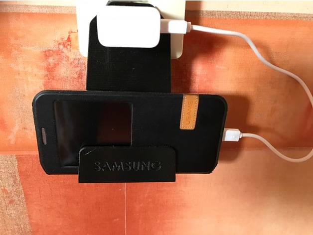 Phone charger holder for wall mounted socket