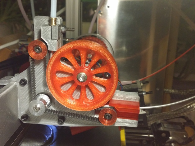 Belt driven and feeding extruder