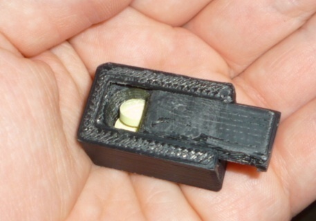 small pillbox with sliding lid