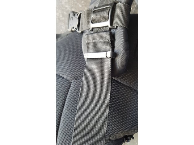 Slingshot backpack shoulder strap binder