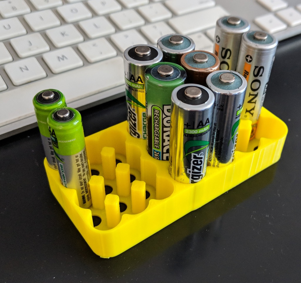 Combined AAA and AA battery holder