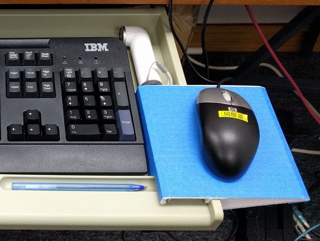 Mouse pad rack for under-table keyboard drawer