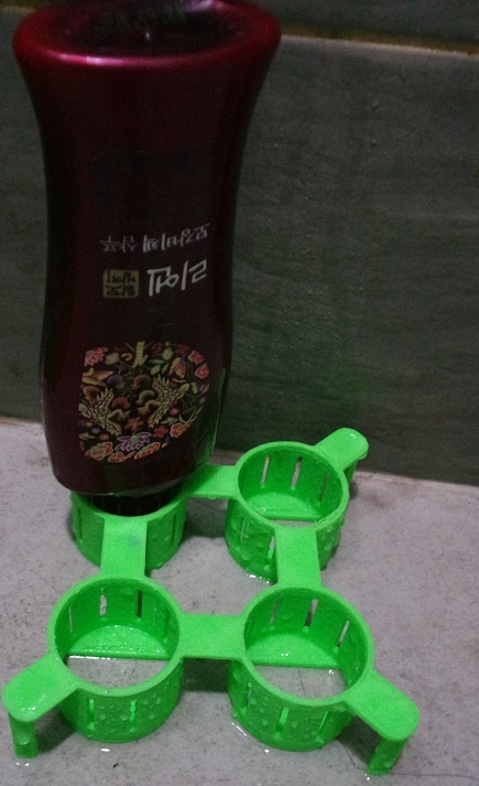 Shampoo bottle upside down Stand / holder