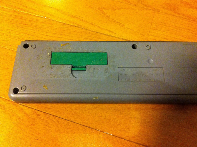 Battery cover for Casio mini keyboard