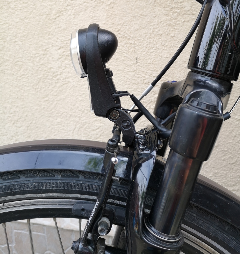 Bicycle headlight support for BMW 