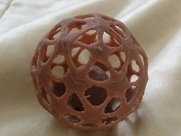 Mesh ball with captive sphere
